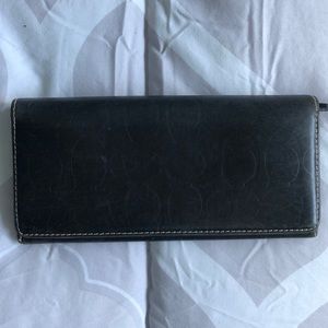 Black logo Coach wallet.